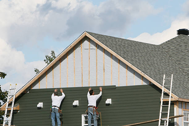 Professional Siding Installation technician working in Washington, GA